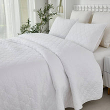 This bedroom features Brandream's quilt/coverlet and pillow sham.