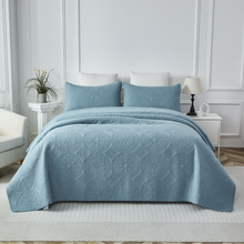 This bedroom features a Brandream Quilt Set.