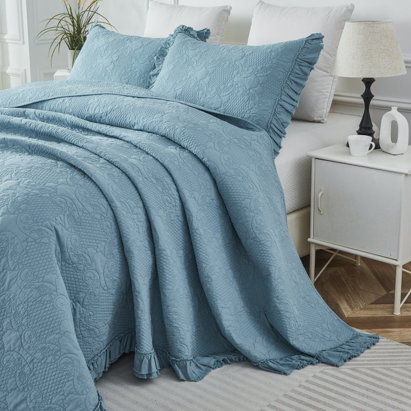 This bedroom features Brandream's quilt/coverlet and pillow sham.