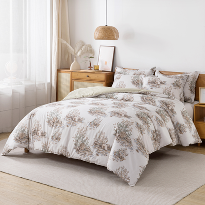 Bedroom with floral-patterned bedding and a plant