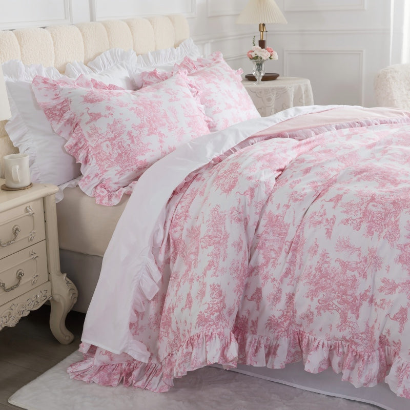 Bedroom with floral-patterned bedding and a plant