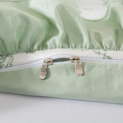 Close-up of a zipper on a floral-patterned fabric with a soft focus background.