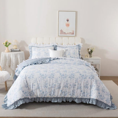 Neatly made bed with white comforter in a bright bedroom setting