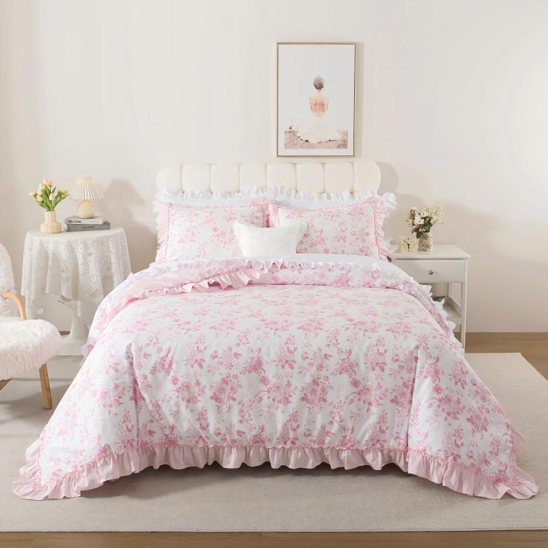 Neatly made bed with white comforter in a bright bedroom setting