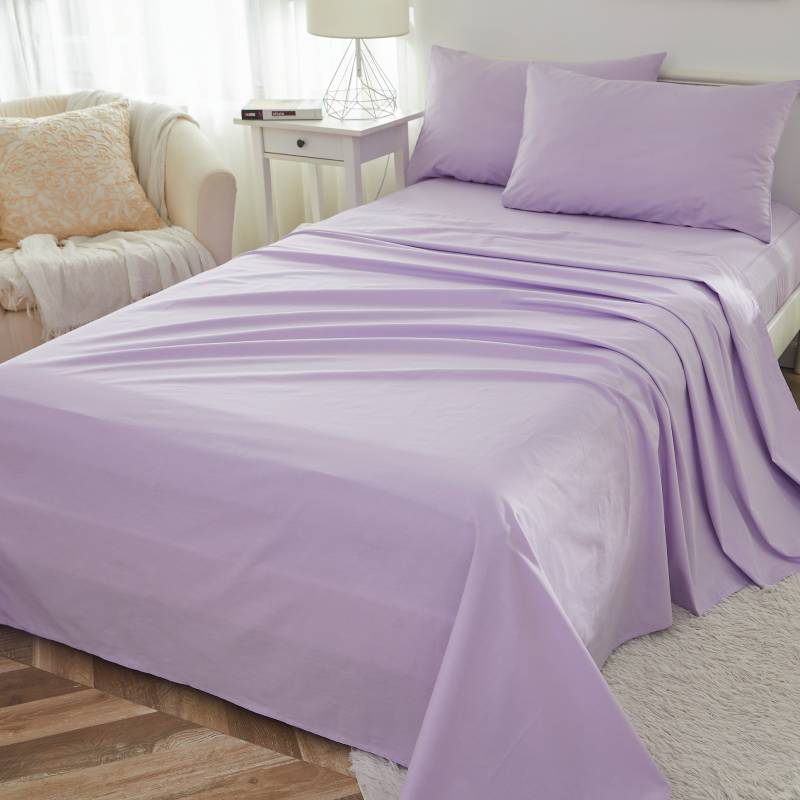 This bedroom features a Brandream four-piece bedding sheet Set.