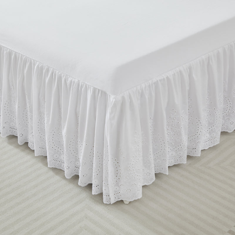 This bed skirt is printed with flowers. 