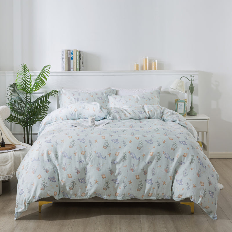Bed with floral comforter in a bedroom setting