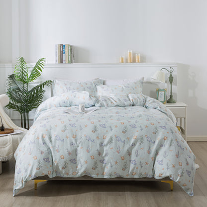 Bed with floral comforter in a bedroom setting